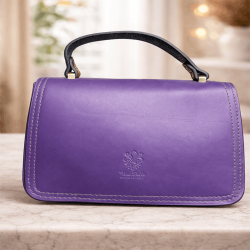 Purple leather bag with black handle