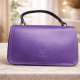 Purple leather bag with black handle