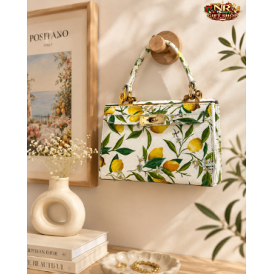 Borsa a Mano Floreale Agrumata di Lusso: Stile ed Eleganza a 69,00€ Borsa a Mano Floreale Agrumata di Lusso: Stile ed Eleganza a 69,00€